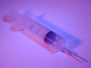 purple syringe