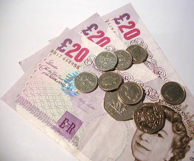 english 20 pound notes and small change. uk money