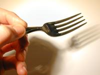 holding a fork