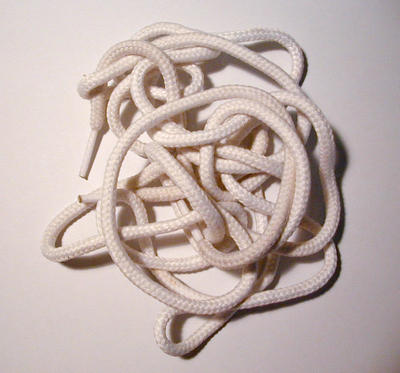   Shoelaces on White Laces   Value Stock Photo