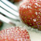 strawberry, sugar and fork