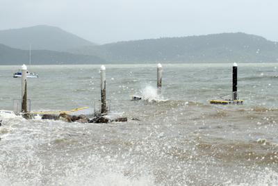 a jetty being wrecked by a strom