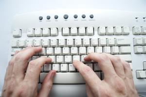 typing on a keyboard