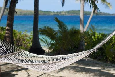 Empty hammock at a tropical beach