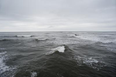 The stormy waves of the North Sea in a cloudy day