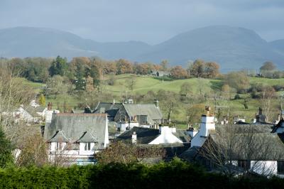 View over the rooftops of Hawkshead to Red Screes