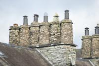 Cylindrical stone chimney pots