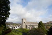 View between trees of Hawkshead Church