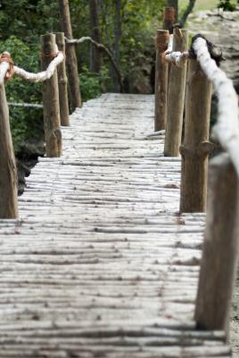 Rickety wooden rural footbridge