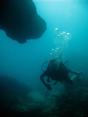 People deep sea scuba diving