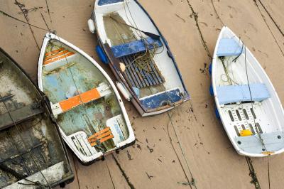 Small wooden boats in St Ives harbour