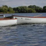 three rowing boats