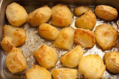 Background of delicious golden roast potatoes