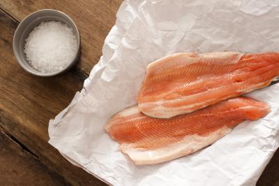 Two raw rainbow trout fillets