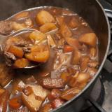 Delicious beef stew cooking in a pot